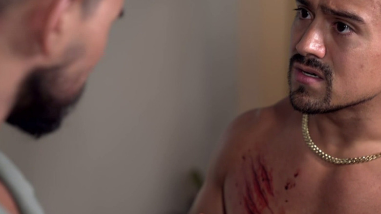 Angel Garza with scratches on his chest