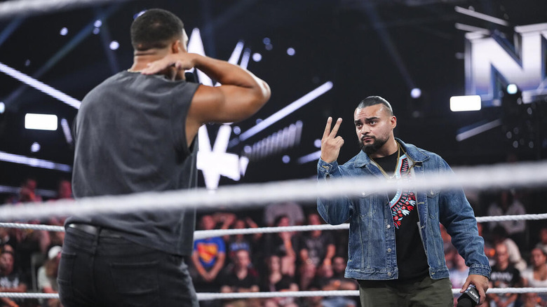 Cruz Montana holds up two fingers to Dion Lennox