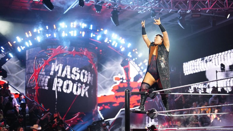 Mason Rook poses in the corner during his entrance before a match on "WWE NXT" television.