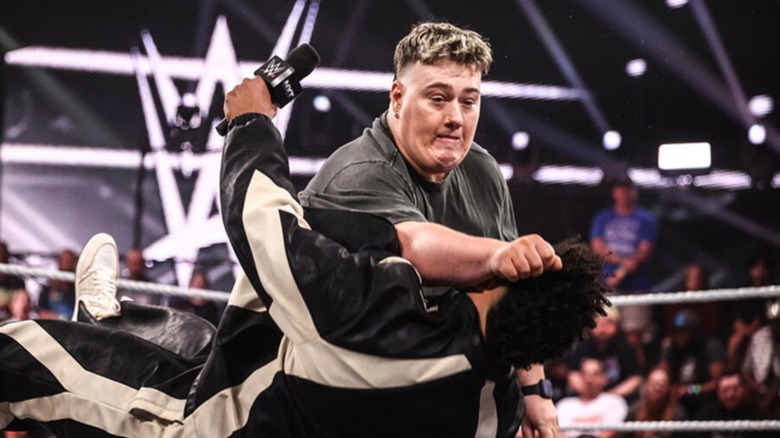 Mason Rook hits a clothesline