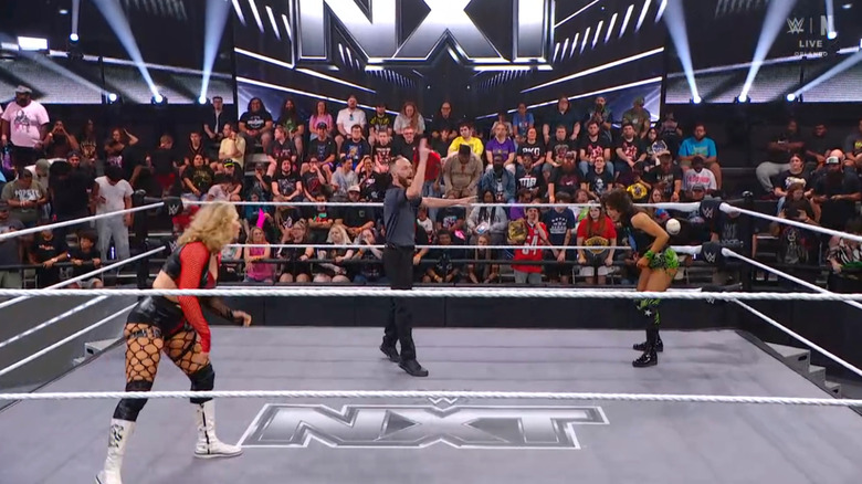 Lyons and Rain staring one another down in the ring