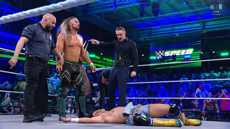 King standing over Starboy as Connors stands next to him