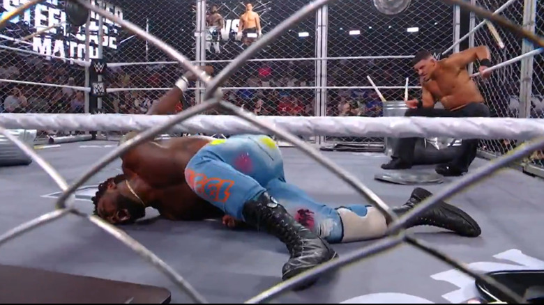 Dion Lennox and Saquon Shugars battle inside a steel cage