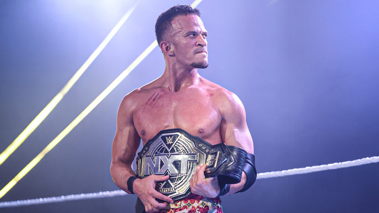 Ricky Saints with the NXT Championship