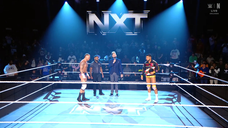 Borne and Page in the ring during the announcement