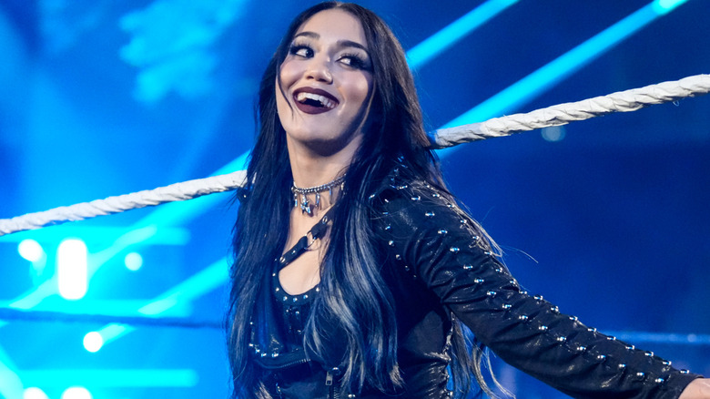 Roxanne Perez leaning against the ring ropes