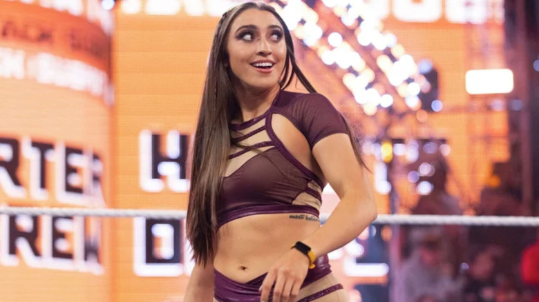 Wren Sinclair wearing brown ring gear
