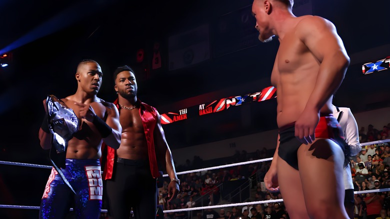 Carmelo Hayes and Trick Williams stare down Ilja Dragunov