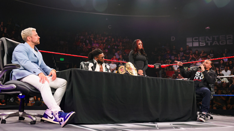 With Ava moderating, Joe Hendry, Trick Williams and Mike Santana all prepare to sign the TNA World Title Slammiversary Contract during NXT Great American Bash at Center Stage Theater on July 12, 2025 in Atlanta, Georgia.