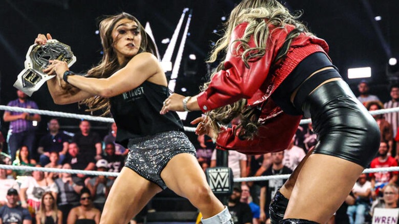 Wren Sinclair attacks Kelani Jordan with the NXT Women's Championship belt