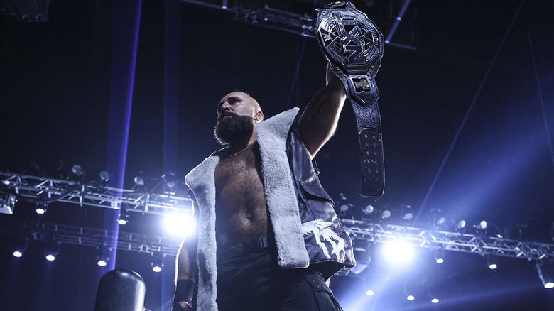 Tony D'Angelo holds up his NXT title at Heatwave