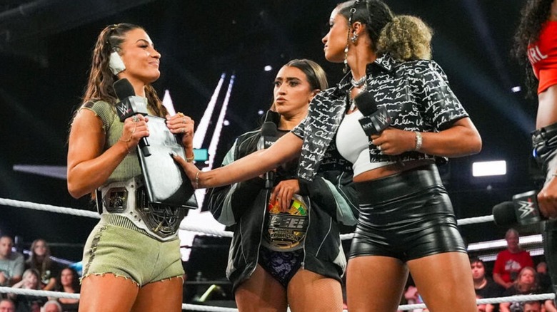 Kelani Jordan grabs a contract from the hands of NXT Women's Champion Kendal Grey in the middle of the ring during the August 11, 2026 edition of "WWE NXT."