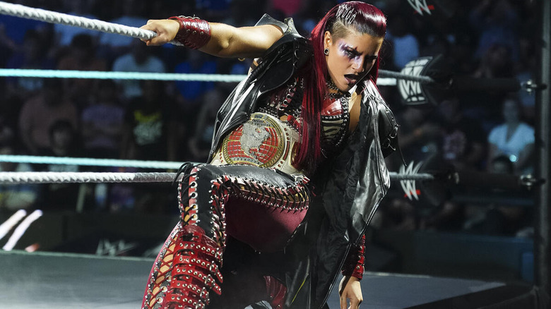 Zaria enters the ring wearing her women's North American title on "WWE NXT"