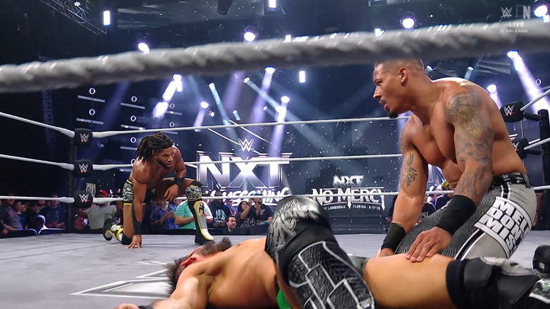 Williams and Hayes in the ring with Gargano