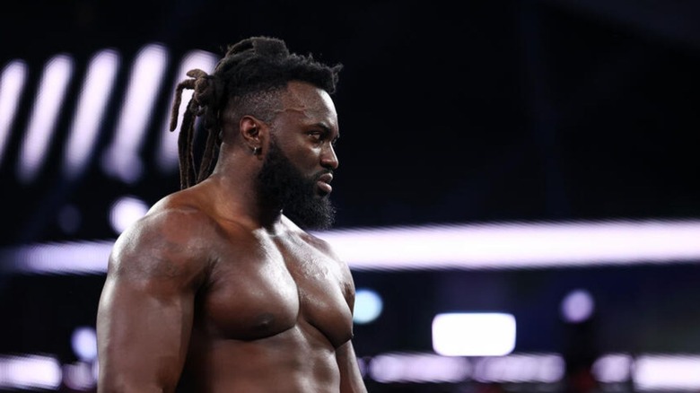 Keanu Carver stares off into the distance in the ring ahead of a match on WWE programming.