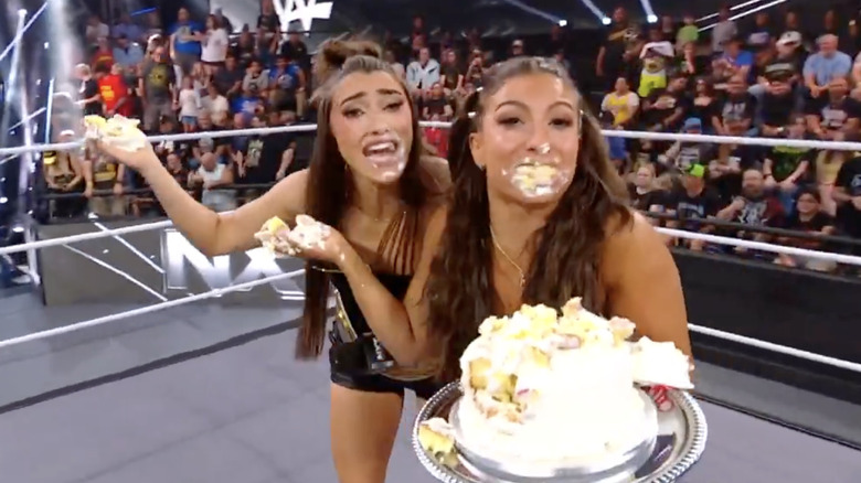 Kendal Grey and Wren Sinclair eat cake