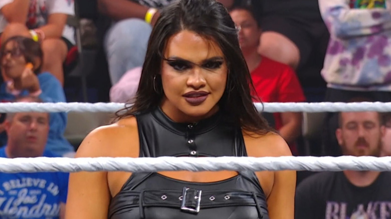 Nikki Blackheart wearing a black top