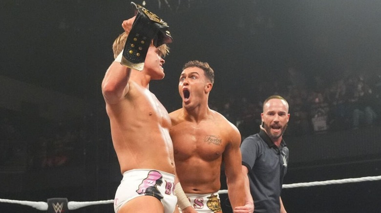 Ricky Smokes gapes in surprise at Brad Baylor after the pair retained their NXT Tag Team Championships at Stand & Deliver 2026.