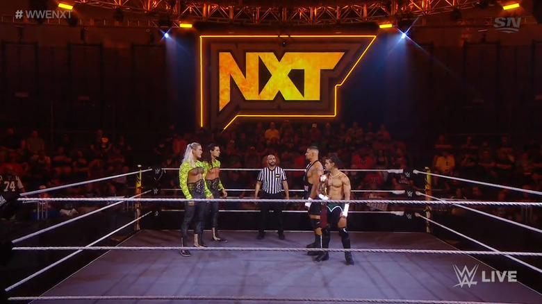 The four men facing off in the ring