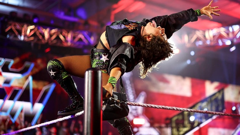 Lizzy Rain hits her signature poses ahead of her debut match on "WWE NXT."