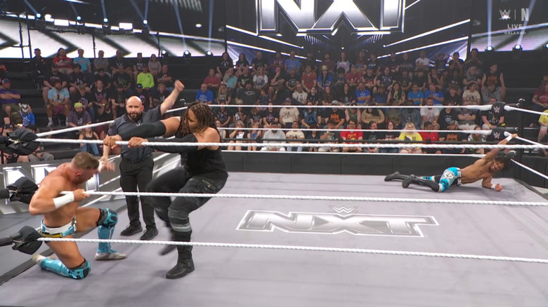 All three men in the ring