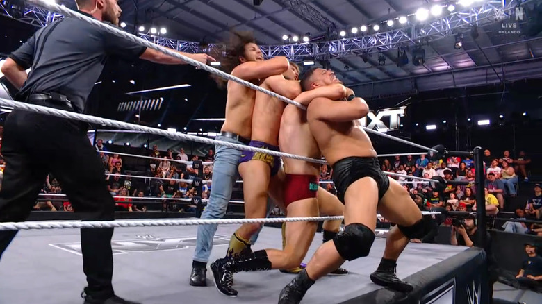 Lennox, Dempsey, Drake, and Hill all trapping one another in submission holds