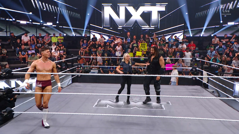 Drake and Troy staring one another down in the ring