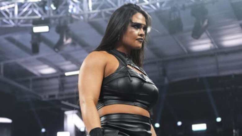 Nikki Blackheart standing tall