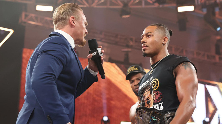 Ilja Dragunov speaking to Carmelo Hayes in the ring on "WWE NXT"