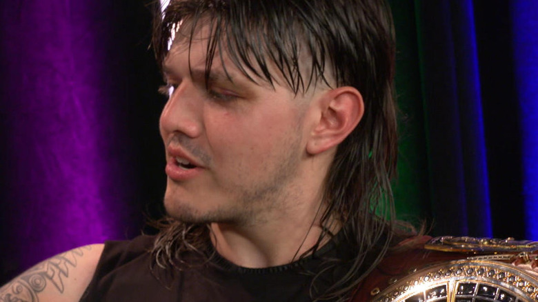 Dominik Mysterio looking to his right