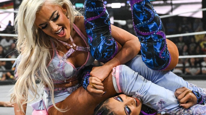 Blake Monroe attempts to roll up Kelani Jordan in the middle of the ring during an episode of 