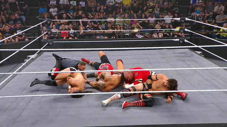 Everyone piled on top of one another in the ring