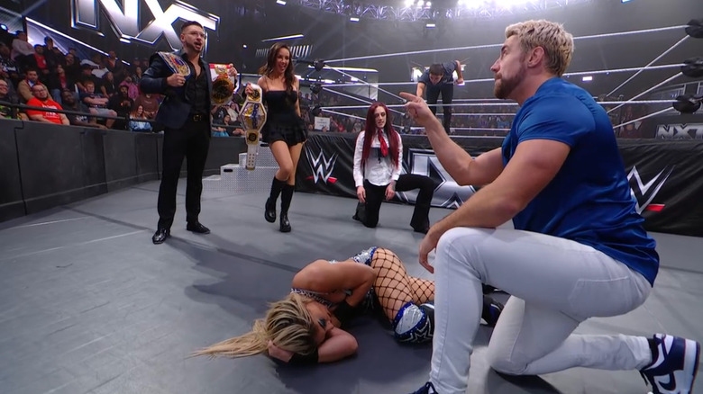 Hendry checking on Hail as Page, Green, and Fyre watch