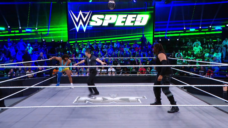 Heights and Troy staring one another down in the ring