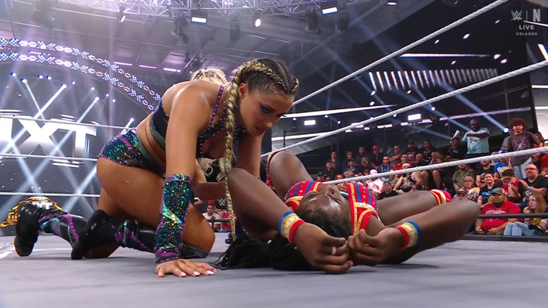 Jordan leaning over Steele