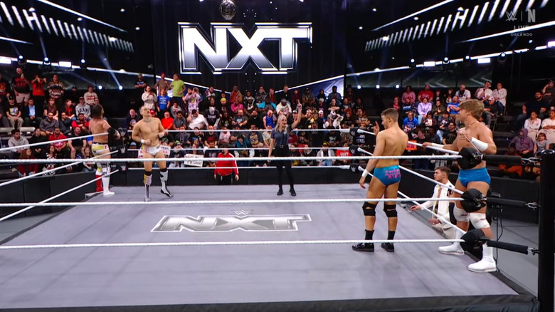 All four competitors in the ring