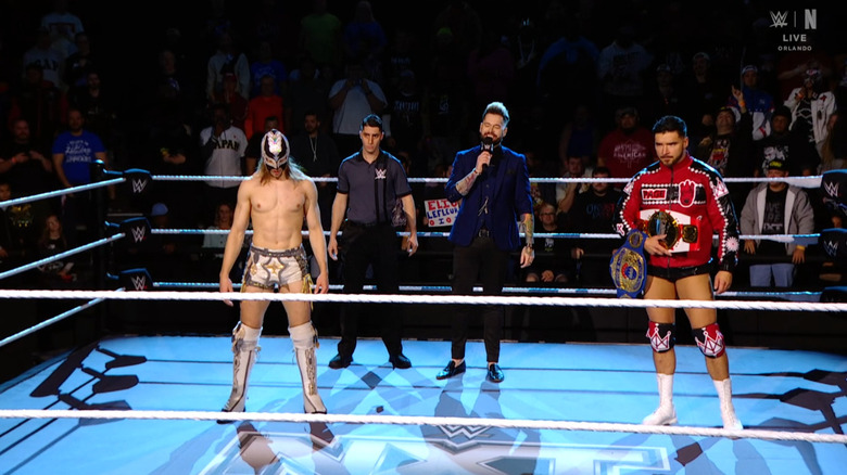 LeFleur and Page standing in the ring during the ring announcement