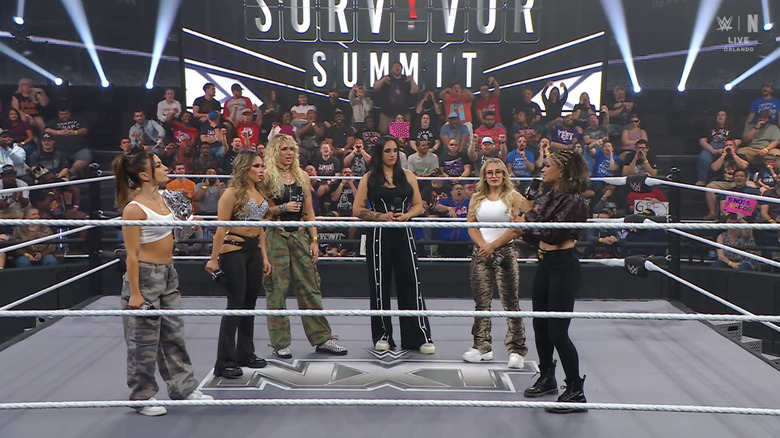 Kendal Grey, Lola Vice, Sol Ruca, Ava, Jordynne Grace, and Kelani Jordan speak in the ring.