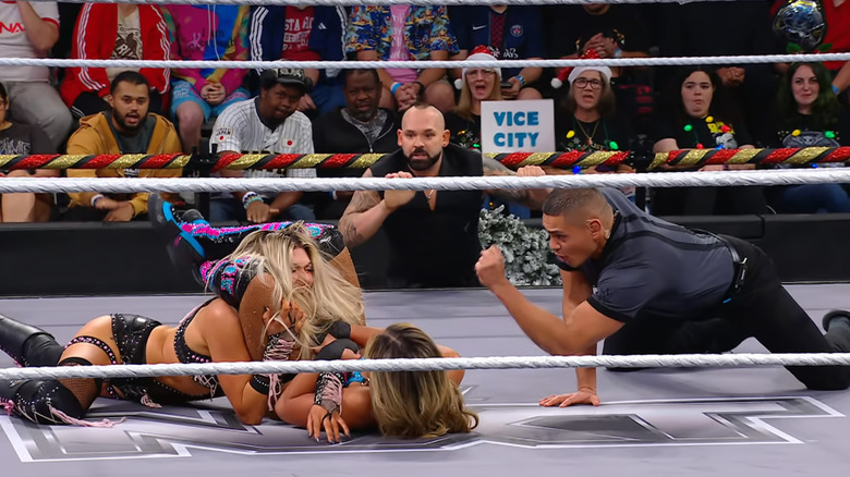 Vice with a Triangle cinched in on Dame