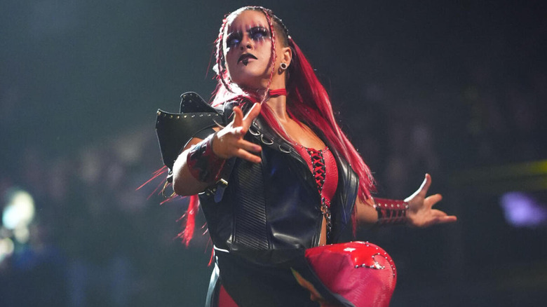 Zaria stares off menacingly during her entrance.