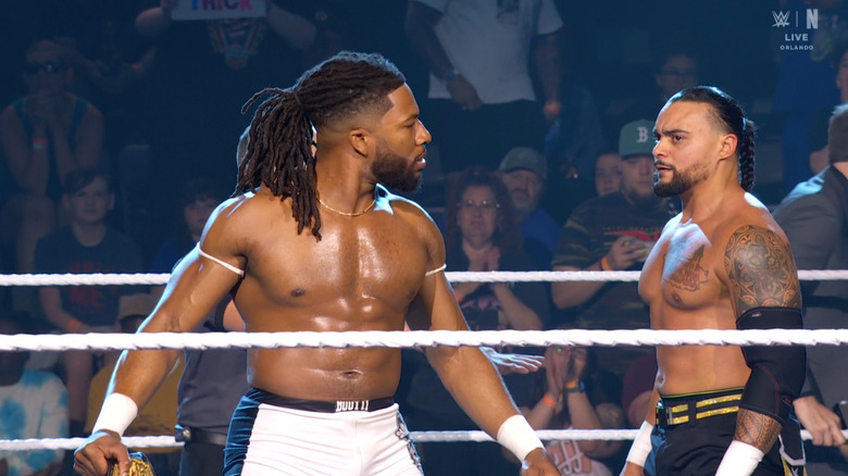 Williams and Santana staring each other down in the ring