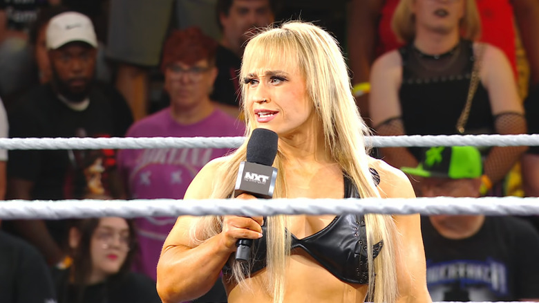 Grace speaking in the ring