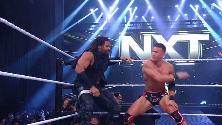 Saints firing off chops on Troy in the ring