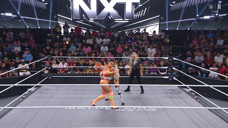 Jordan with a submission locked in on Monroe