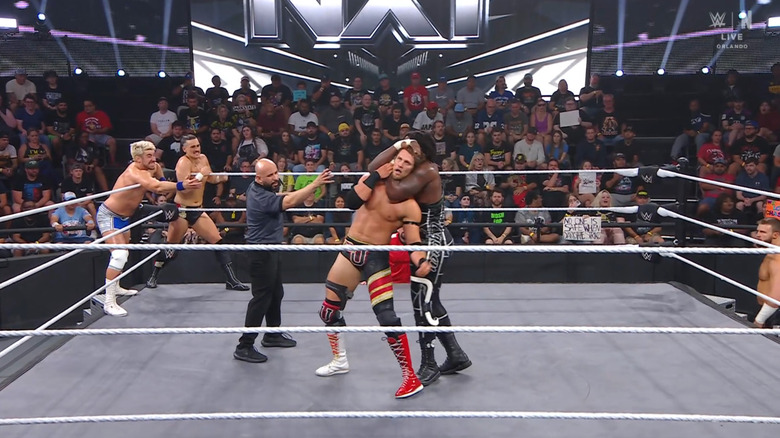 Several competitors in the ring