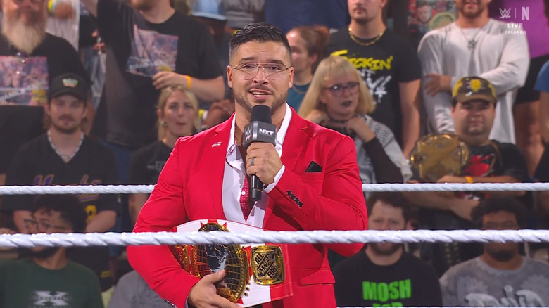 Page speaking on the microphone