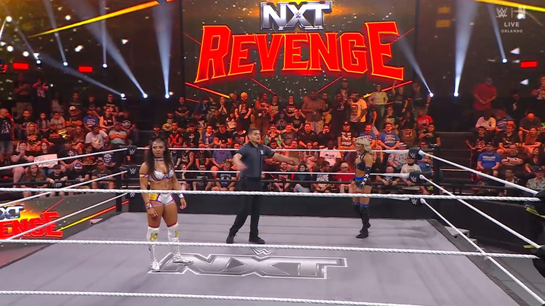 Armstrong and Raye both in the ring