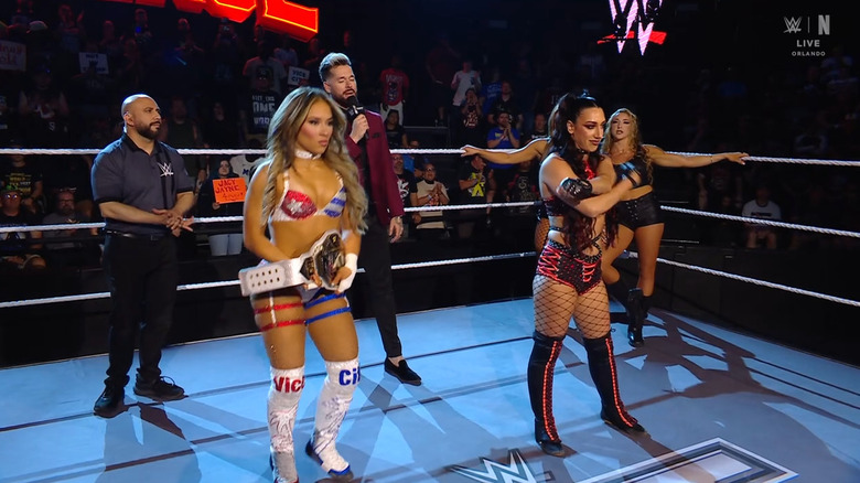 Vice and Fatal Influence in the ring during the announcement