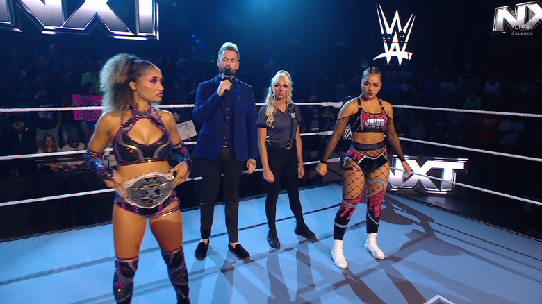 Both women in the ring during the ring announcement