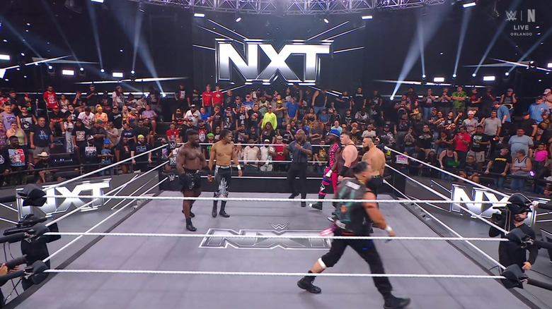 All six men inside the ring